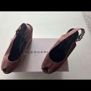 CLERGERIE Elevated with a provocative peep-toe design